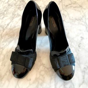 Michael Kors black leather pumps. Slightly enjoyed.